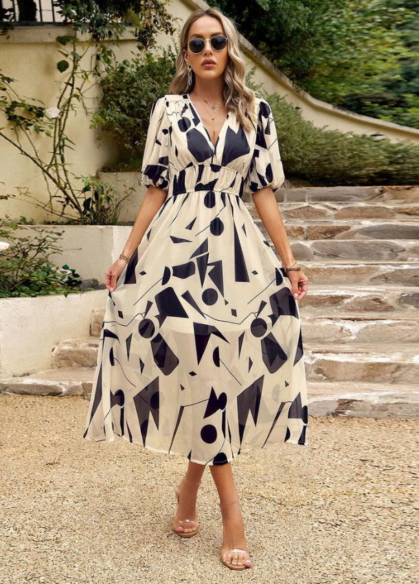 Mella | The Smocked Floral Midi