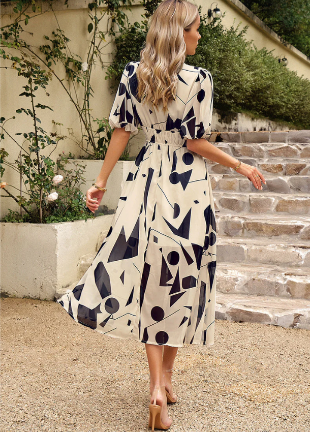 Mella | The Smocked Floral Midi