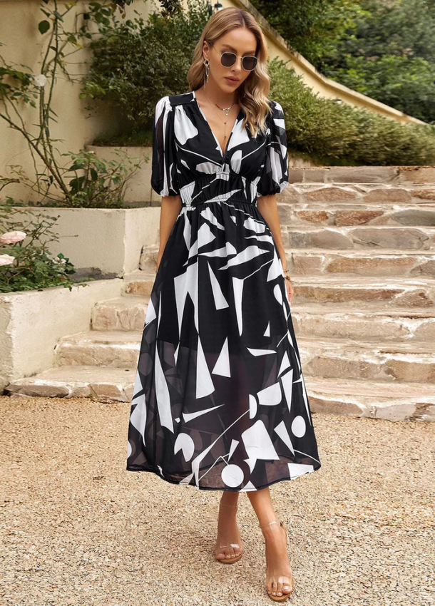 Mella | The Smocked Floral Midi